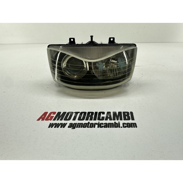 FARO DELANTERO LENTICULAR APRILIA SR 150 2T...