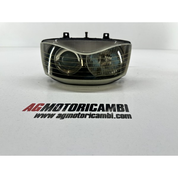 FARO DELANTERO LENTICULAR APRILIA SR 150 2T...